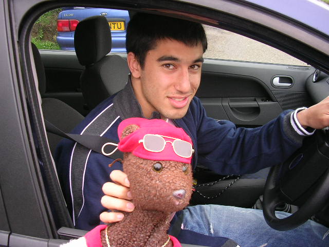 Daniel Karbassiyoon holding Bearsac