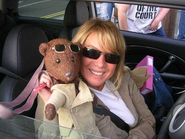 Actor Leticia Dean holding Bearsac in her car