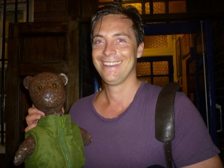 Stephen Campbell Moore holding Bearsac