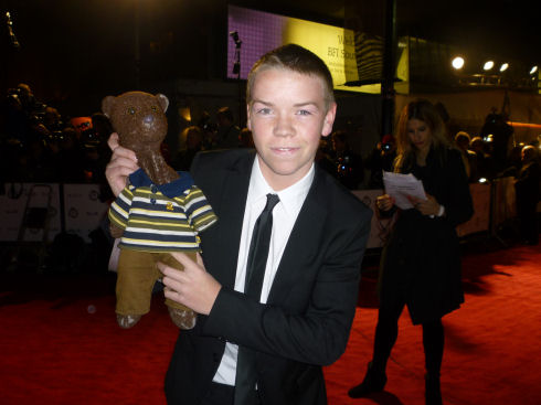 Will Poulter holding Bearsac
