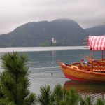 Tourist boat at moor on Lake Bled