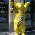 Bearsac and family on paw of Berlin's United Buddy Bear