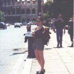 Debra holding Bearsac and Rizla with the Colosseum in background