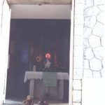 Bearsac and Rizla sitting in doorway of La Madonnina monument