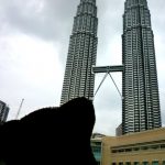 Bearsac with his muzzle tuned up towards the Petronas Towers
