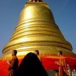 Temple dome and monks, with Bearac's muzzle echoing the shape of the dome