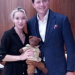 Maria Struckova and Nicholas Chalmers holdig Bearsac the teddy bear