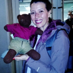 Lisette Oropesa holding Beasac the teddy bear'