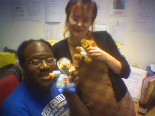 Man and woman each holding teddy bear