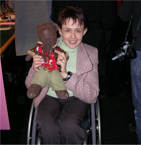 Dame Tanni Grey-Thompson holding Bearsac