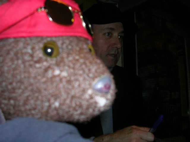 Kevin Spacey in background Bearsac in forground
