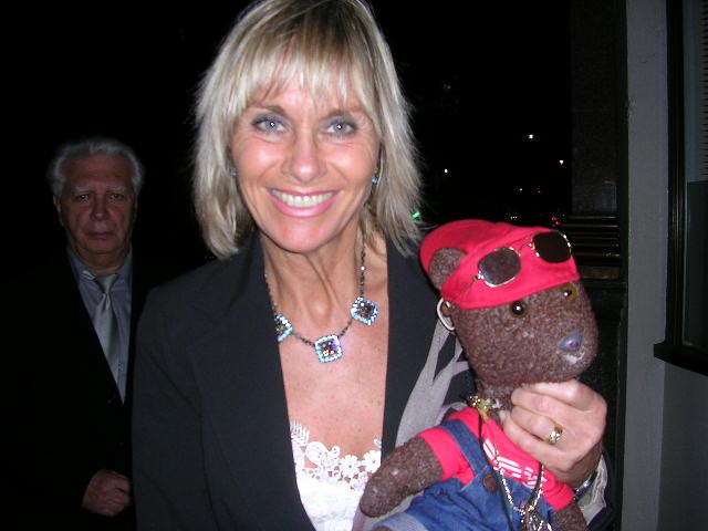 Actor Linda Haydon holding Bearsac