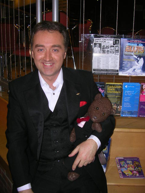 Singer Mark Porter holding Bearsac