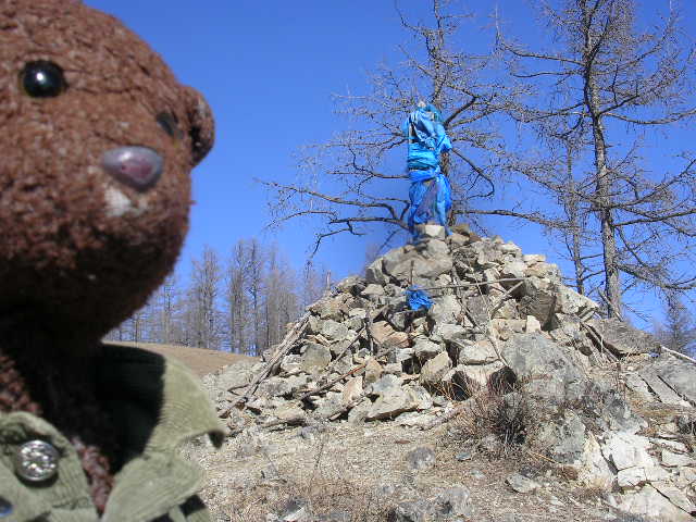 Ovoo. pile of rocks with blue silk for sky