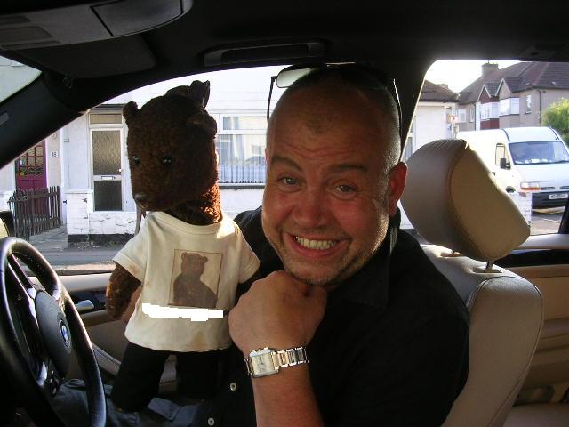 Cliff Parisi holding Bearsac in his car