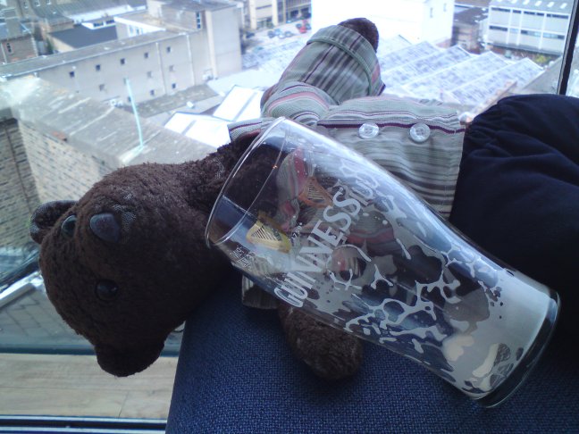 Drunk Bearsac and empty Guinness glass