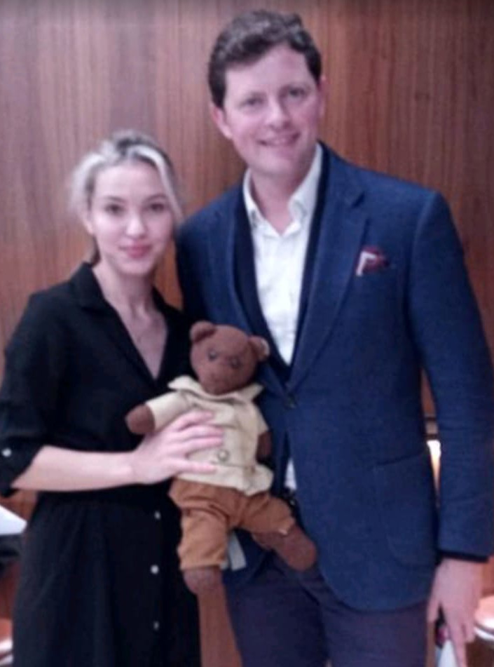 Maria Struckova and Nicholas Chalmers holdig Bearsac the teddy bear