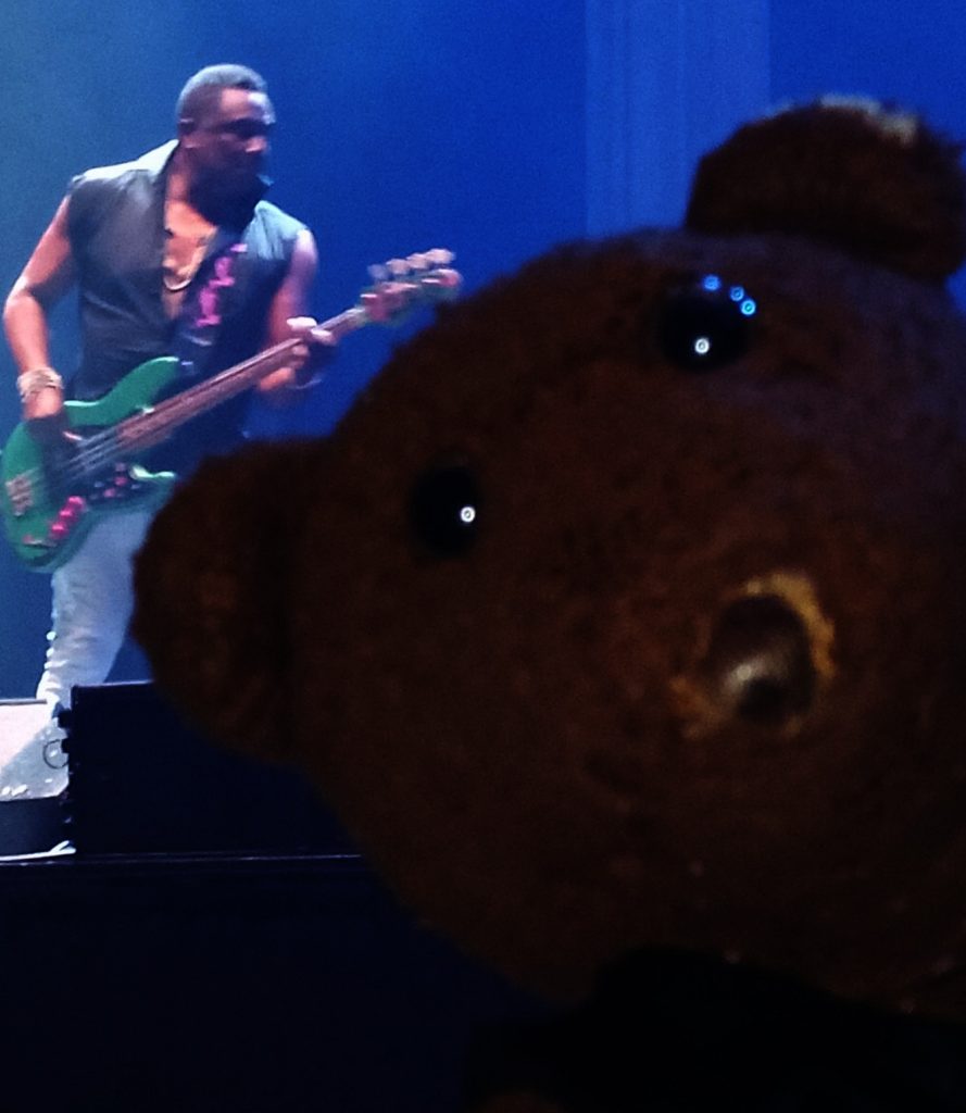 Bearsac's face in foreground of Andrew Levy