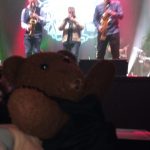 UB40 brass musicians with Bearsac in foreground.