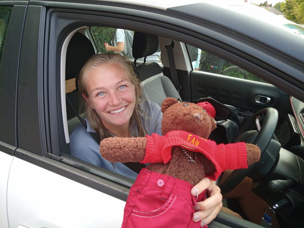 Teddy bear, Bearsac being held by Arsenal WFC player
