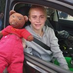 Teddy bear, Bearsac being held by Arsenal WFC player