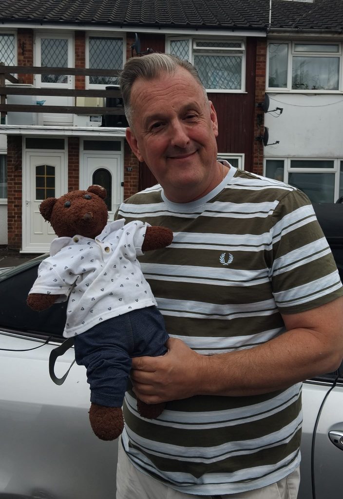 Ross Boatman holding teddy bear Bearsac