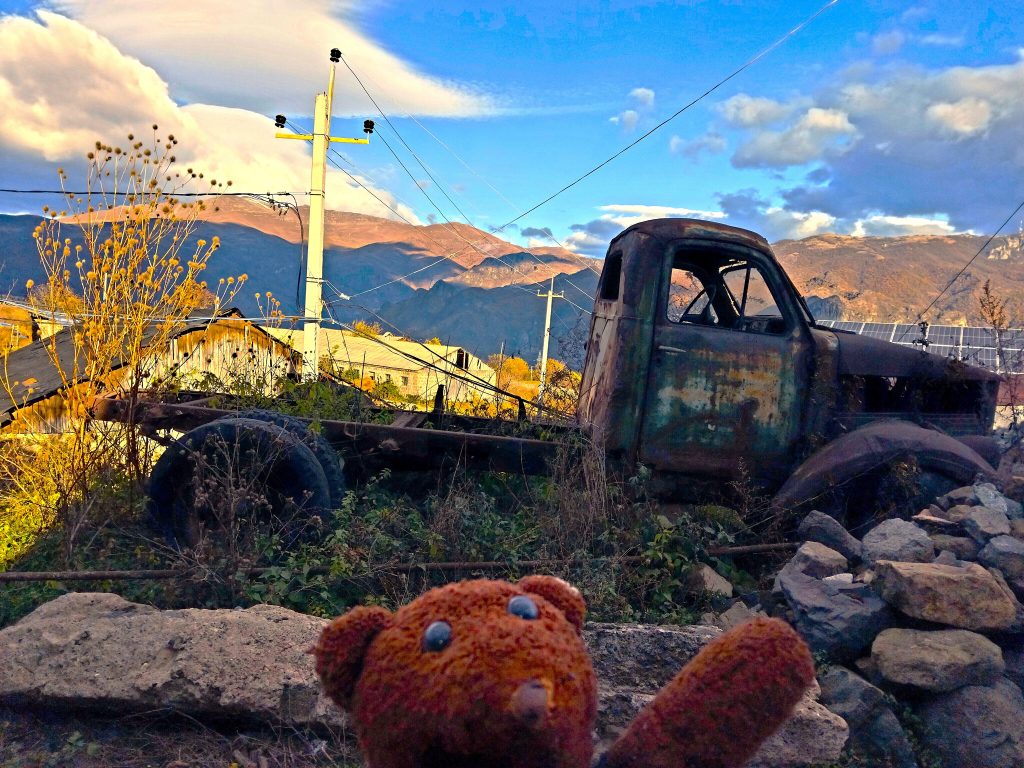 Bearsac the teddy bear in forground of 