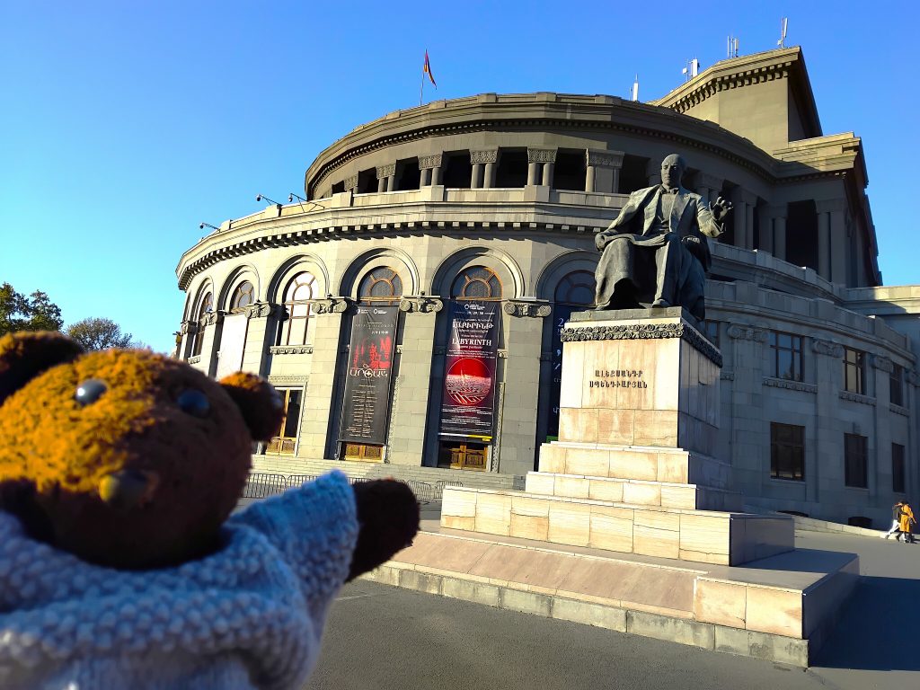 Bearsac the teddy bear in forground of 