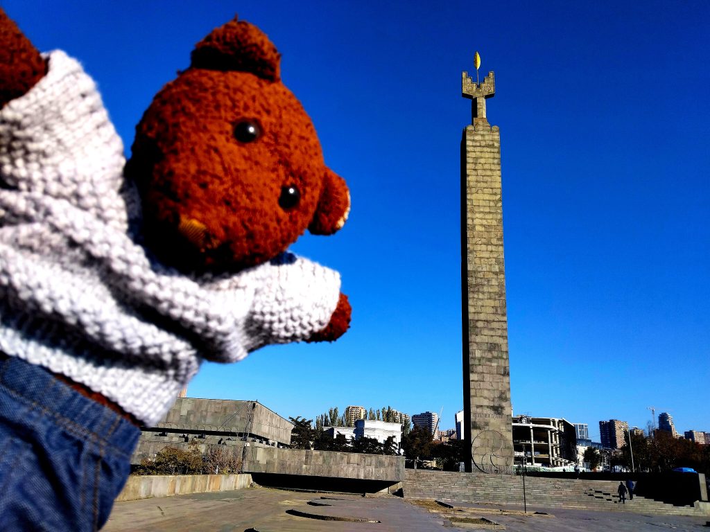 Bearsac the teddy bear in forground of 