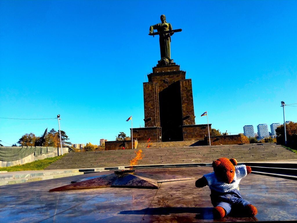 Bearsac the teddy bear in forground of 