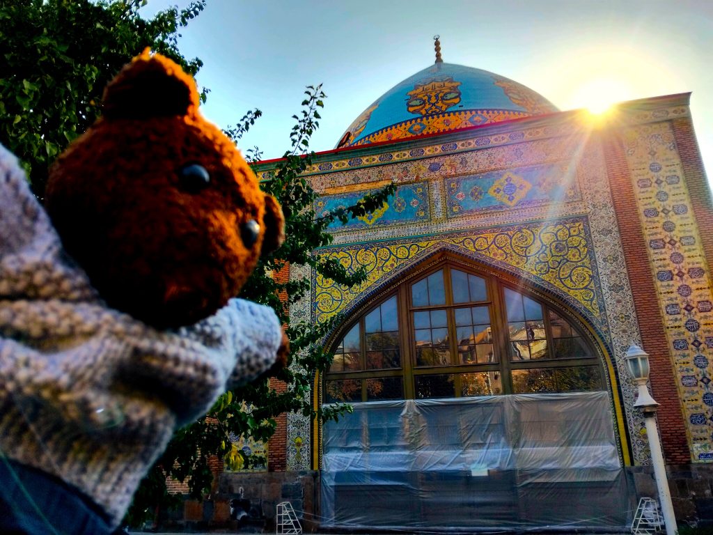 Bearsac the teddy bear in forground of 