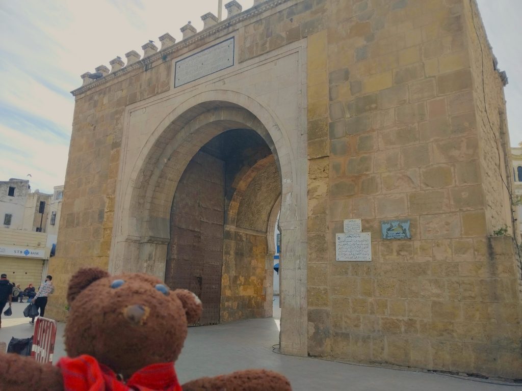 Bearsac the teddy bear in the forground of Bab el Bahr