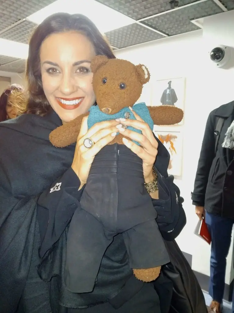 Joyce El-Khoury holding Bearsac the teddy bear
