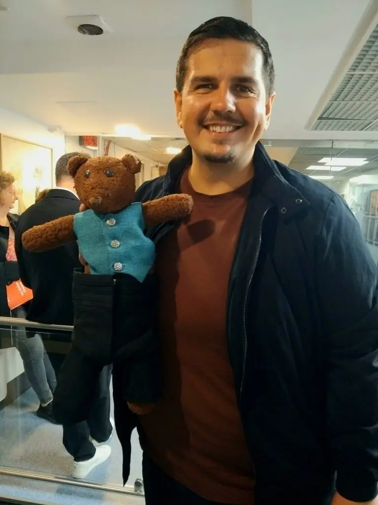 Valentyn Dytiuk holding Bearsac the teddy bear