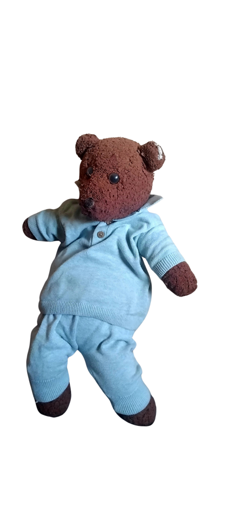 Bearsac teh teddy bear wearing a powder blue wool suit