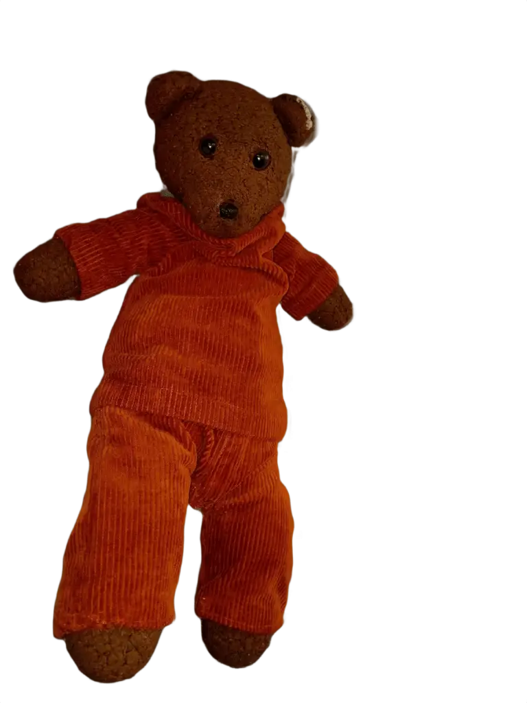 Bearsac the teddy bear wearing an orage corduroy suit