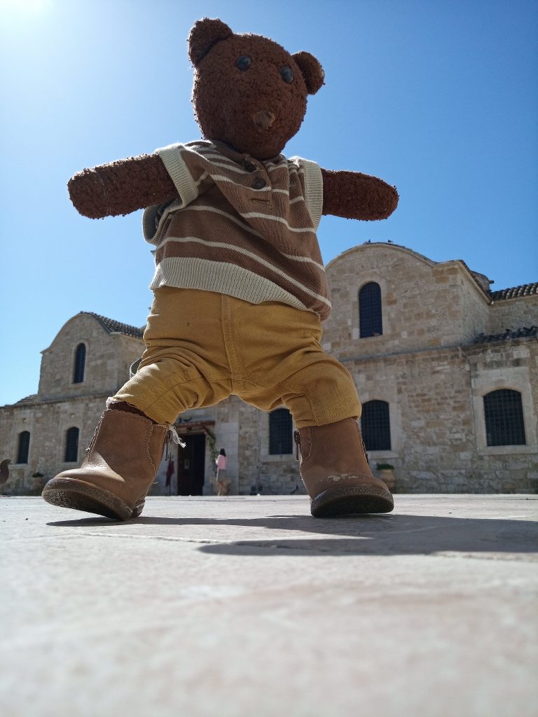 Bearsac standing in the forground of the Holy Church of Saint Lazarus.