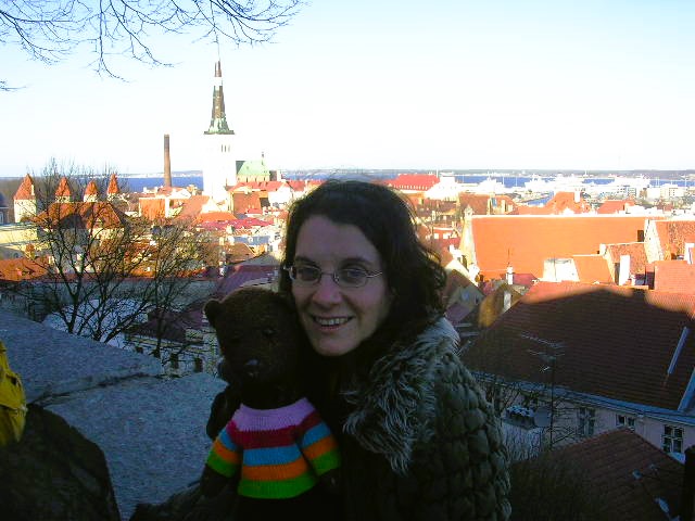 Bearsac and DEbra in the foreground of a city view if Tallin.