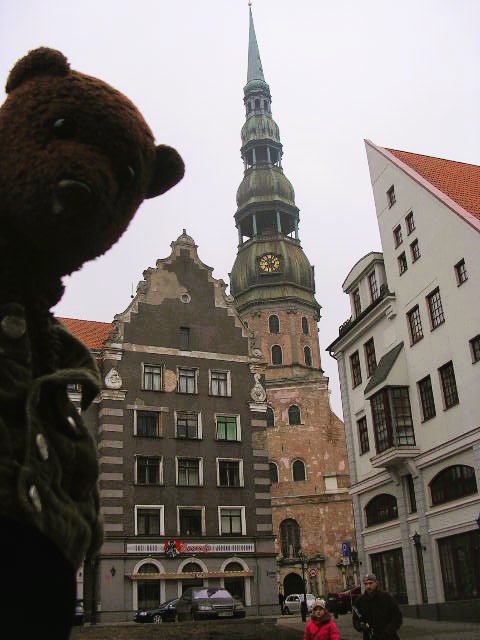 Bearsac in the forground of a church steeple