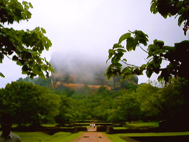 Bearsac the teddy bear in forground of Mount Sigiriya.