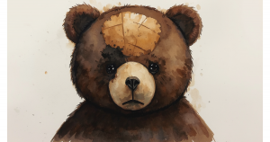 Image of a teddy bear with a bald patch on its forehead